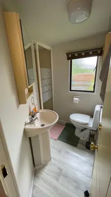 a bathroom with a sink and a toilet at Riviera Zator in Zator