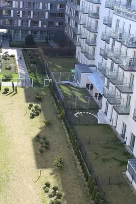 an aerial view of a building next to a building at Nowe Zabłocie II in Kraków