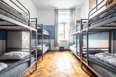 a room with four bunk beds in it at Das Hostel in Kraków