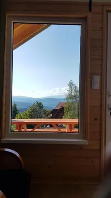 an image of the sun setting over the mountains at Podbucznik 1 Pilsko in Targoszów