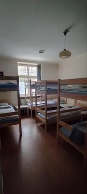 a room with a bunch of bunk beds at Hostel ALEX&TSA in Kraków