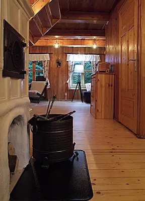 a room with a pot on a stove in a cabin at DOM NAD POTOKIEM in Zawoja