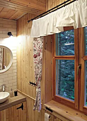 a bathroom with a sink and a window at DOM NAD POTOKIEM in Zawoja