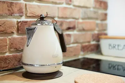 a white blender sitting on top of a counter at apartamenty Stary Kraków GO in Kraków