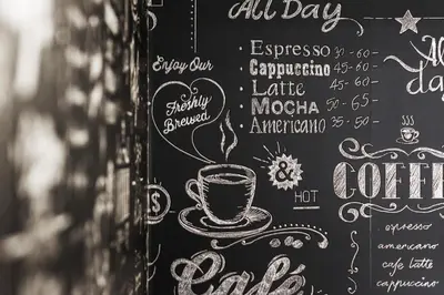a chalkboard with a cup of coffee on it at Apartments Harmonica Trynitarska by Noclegi Renters in Kraków