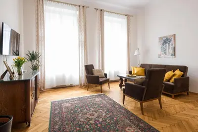 a living room with a couch and chairs and a table at Belle Epoque I, luxury suite 50m to Main Square in Kraków