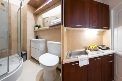 a small bathroom with a toilet and a sink at Belle Epoque I, luxury suite 50m to Main Square in Kraków