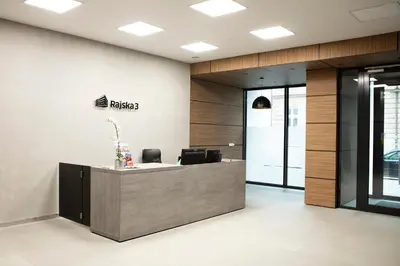an office with a reception desk in a lobby at Rajska Blue Luxury Apartment in Kraków
