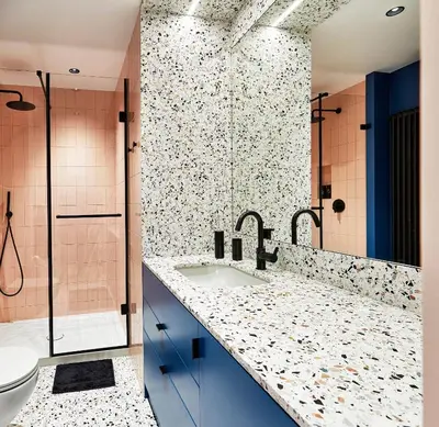 a bathroom with a sink and a shower at Rajska Blue Luxury Apartment in Kraków