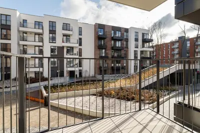 a view of an apartment complex from a balcony at Apartments GO Rakowicka by Noclegi Renters in Kraków