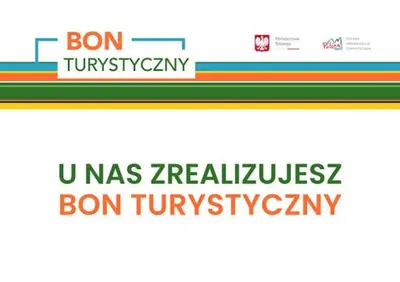 a sign with the words bon tum university and the words bon tum frequency at Apartament Deluxe Old Town św. Krzyża WAWELOFTS in Kraków