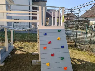 a play tower with colorful balls on a ladder at Pokoje pod Baranami Zator Przeciszów in Przeciszów