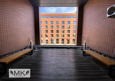 a stairway with benches and a building in the background at MK Angel Apartment in Kraków