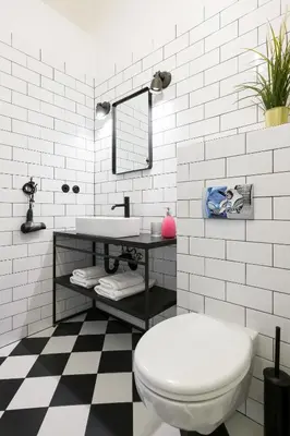 a white bathroom with a toilet and a sink at Discover Krakow Apartments - 3 Rakowicka St - Amazing Loft near Main Station - Netflix in Kraków