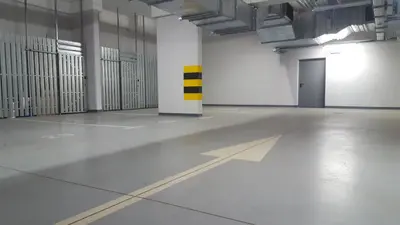 an empty room with a yellow and white pole in it at Julia Apartments Rakowicka - Old Town in Kraków
