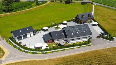 an overhead view of a large house with a driveway at Rajska Oaza in Przybradz