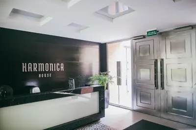 a hallway with a door and a sign that says hamorman house at Nica Old Town Free Parking Spacious Sunny Terrace in Kraków