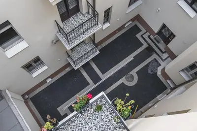 an overhead view of a balcony with flowers on it at Art of Serenity in Kraków