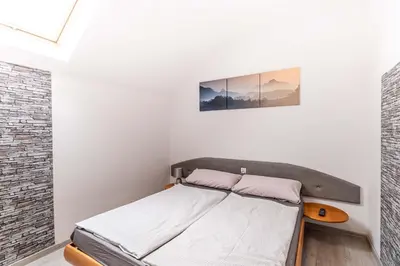 a bedroom with a bed in a room at Motel OLIV in Oświęcim