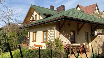 a small house with a green roof at APARTAMENTY-STUDIO noclegi wczasy wakacje ferie - pobyty rodzinne in Rabka