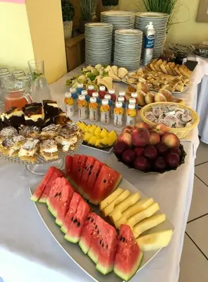 a table topped with lots of different types of fruit at Ośrodek Szkoleniowo Wypoczynkowy ROŻNÓW in Rożnów