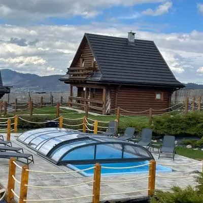 Domki Zagroda Domek z bala z basenem & sauna & balia z hydromasażem