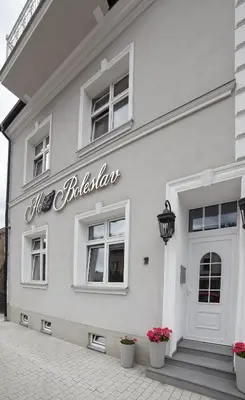 a building with a sign that reads the bibliography at Boleslav Home in Sucha Beskidzka