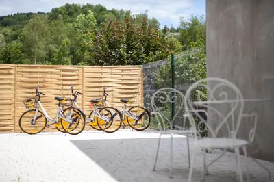 three bikes parked in front of a fence at Boleslav Home in Sucha Beskidzka