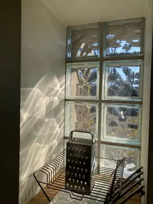 a window with a basket in front of it at Boleslav Home in Sucha Beskidzka