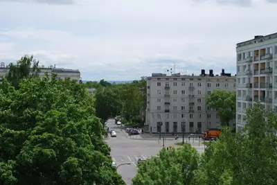 a view of a street in a city with buildings at THE HEART OF NOWA HUTA - free garage in Kraków