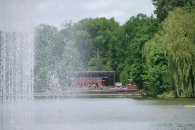 a fountain in the middle of a body of water at THE HEART OF NOWA HUTA - free garage in Kraków