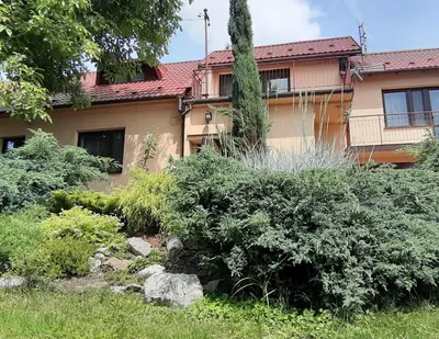 a garden in front of a house at Dom nad Wisłą in Czernichów