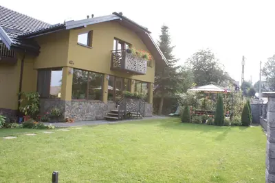 a house with a lawn in front of it at Agrogosia in Czajowice