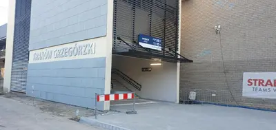 an entrance to a building with a sign on it at Apartament Daszyńskiego in Kraków
