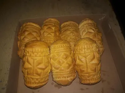 a box filled with waffles sitting on a table at Agroturystyka U Misia in Niedźwiedź