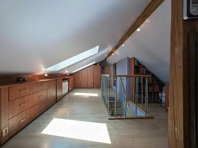 a hallway with a staircase in a house at OLSZA RESIDENCE Cozy & quiet 2 level apartment in Kraków
