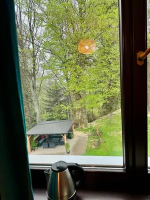 a view of a picnic table from a window at Villa Vincentów in Myślenice