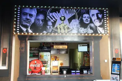 a movie sign above the entrance of a restaurant at QUEST HOTEL - dawniej Hotel Planeta in Brzesko