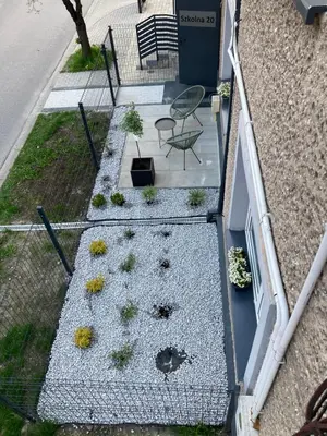 an overhead view of a patio with plants on a building at Apartament loft Krzeszowice centrum in Krzeszowice