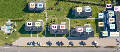an overhead view of houses with numbers on their roofs at Słoneczne Wzgórze Zator in Zator