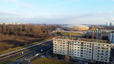 an aerial view of a building with a large stadium at Apartament Lema Versace in Kraków