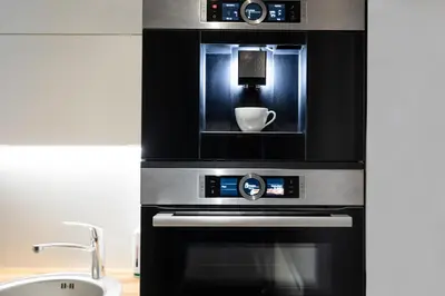 a microwave oven in a kitchen with a sink at Rainbow Apartments 3 in Kraków