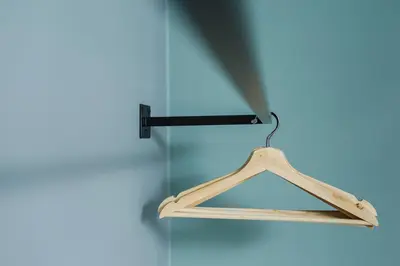a wooden hanger hanging from a ceiling at Apartament 3d GO by Noclegi Renters in Kraków