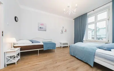 a bathroom with a shower and a sink and a toilet at Beautiful Apartment on Main Square / Old Town / City Center in Kraków