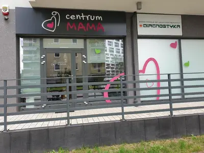 a store with a sign in the window of a store at ap4you Tauron Cracow in Kraków