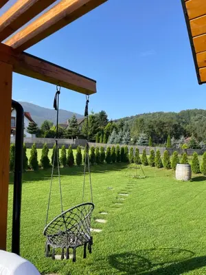 a swing in the yard of a house at Miętusowa Chata pod Babią in Zawoja