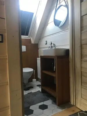 a bathroom with a sink and a toilet at Miętusowa Chata pod Babią in Zawoja