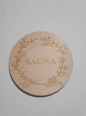 a medal with the name sanu on it at Zakątek DoriMaks in Zawoja