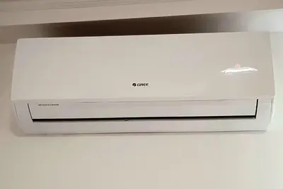 a dvd player sitting on top of a wall at GAJ Apartment - Air condition, free parking in Kraków