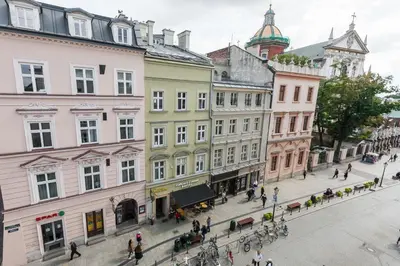 a view of a street in a city with buildings at Vintage Senacka 5 Apartments in Kraków